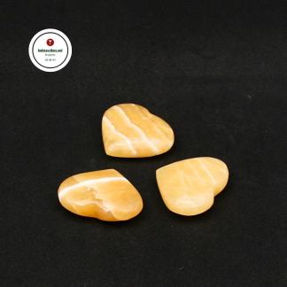 Oranssi Kalsiitti Sydän Voimakivet merkitys Kristalli kauppa Mistä ostaa kristalleja Kivet ja kristallit merkitys käyttö Energiakivet Parantavat kivet