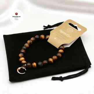 Kivirannekoru Kuunsirppi Tiikerinsilmä samettipussissa Voimakivi korut Kristalli rannekoru Magia kauppa