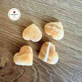 Oranssi Kalsiitti Sydän Voimakivet merkitys Kristalli kauppa Mistä ostaa kristalleja Kivet ja kristallit merkitys käyttö Energiakivet Parantavat kivet